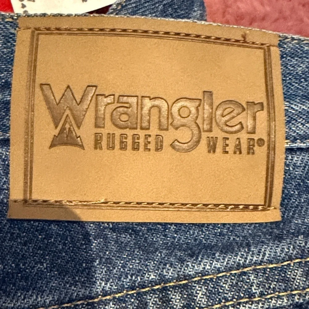 NWT Wrangler Men's Rugged Wear Relaxed Fit Thermal Jeans blue fleece lined 36x36